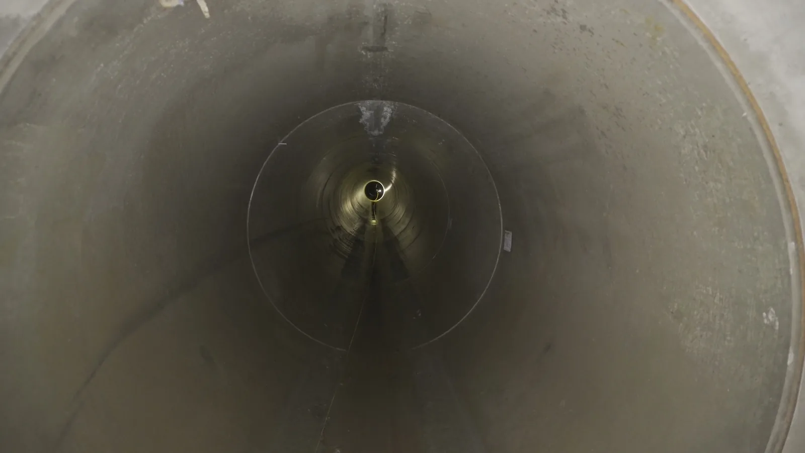 Scout 137 flying inside a large concrete waste-water pipe