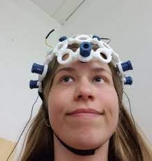 Kjersti with EEG sensors attached to her head