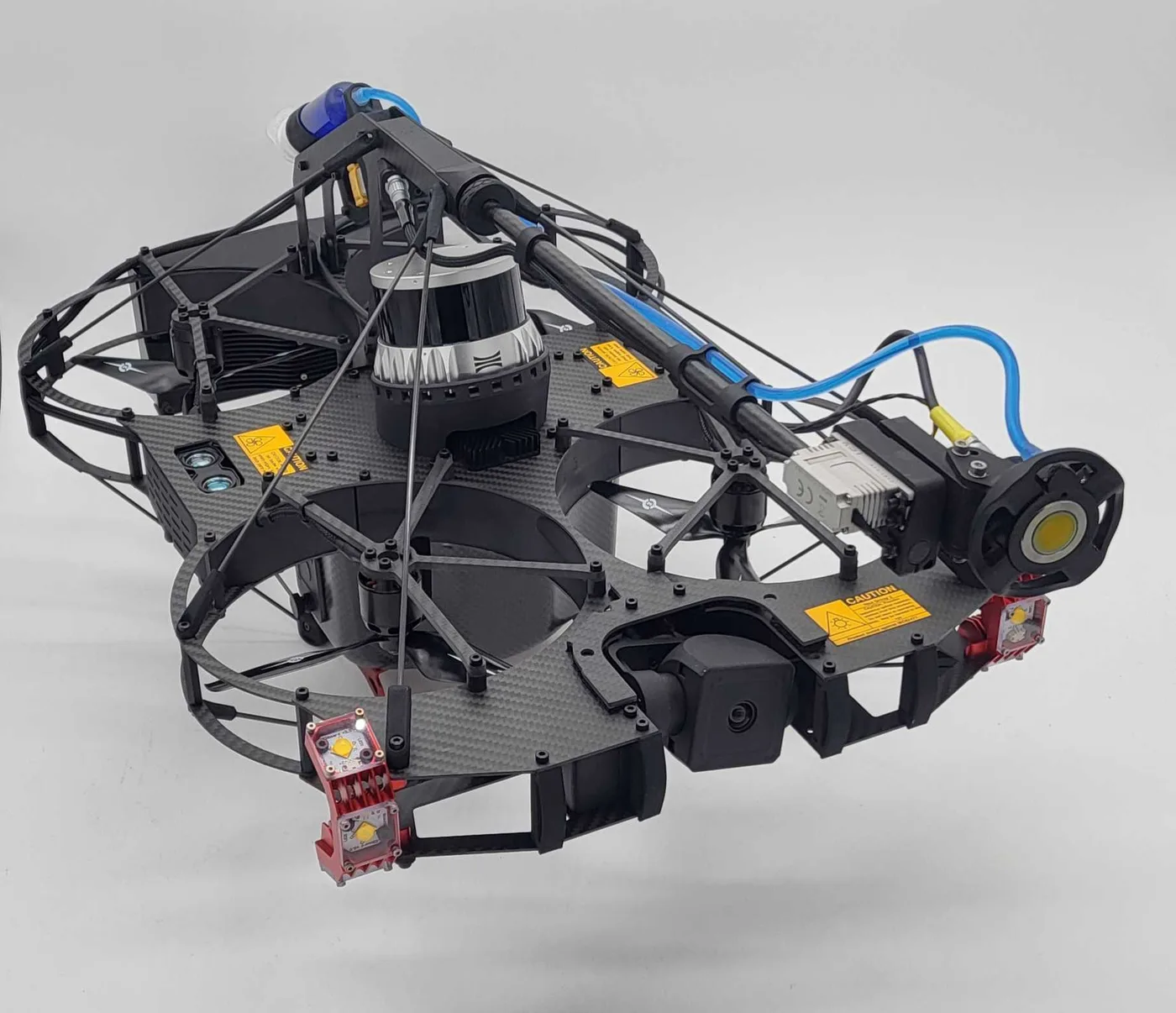 Scout 137 Gen 2 with the UTM payload arm mounted — probe, couplant line and beacon