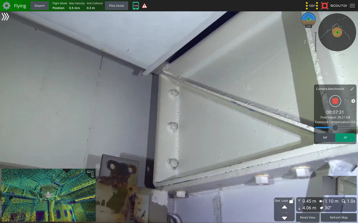Scout Operator app screenshot at 1× zoom, showing full flight telemetry, point-cloud map and distance lock overlaid on the live camera feed, captured in ScoutDI's Flight Lab