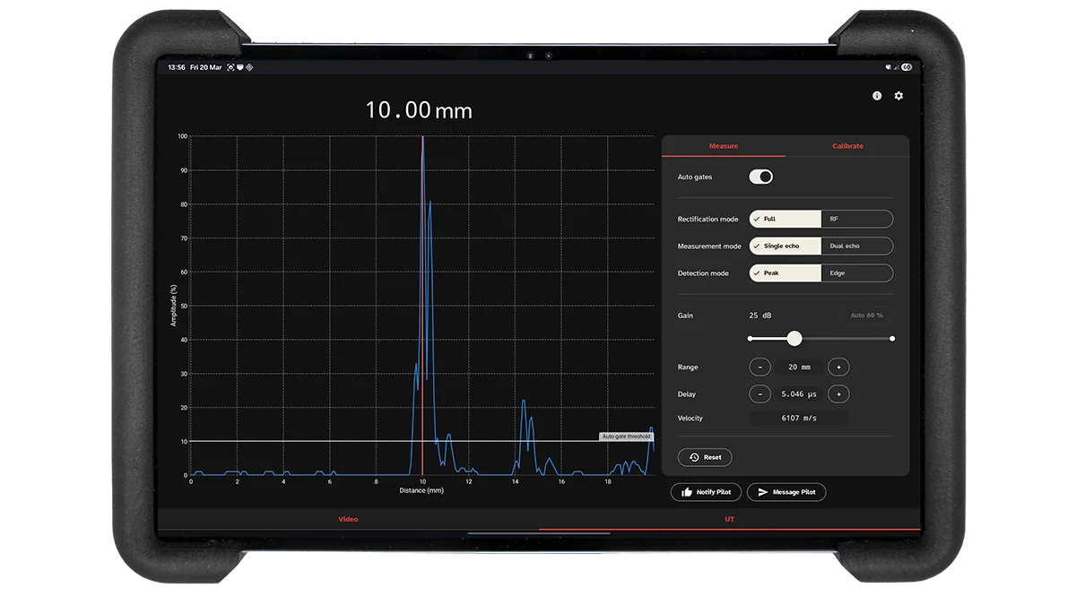 Scout Companion — the NDT technician's rugged tablet showing the live A-scan at 10.00 mm, peak detection, auto-gates and calibration controls