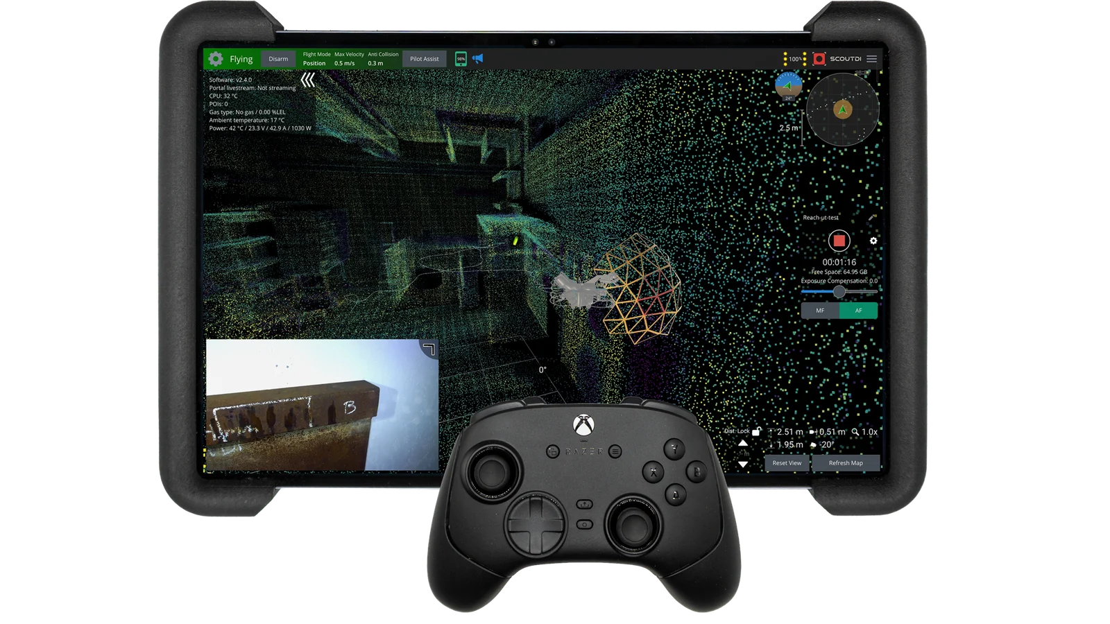 Scout Operator on the rugged 14.6-inch pilot tablet with hand controller — high-resolution live video, the SLAM point cloud and the virtual cage on one screen