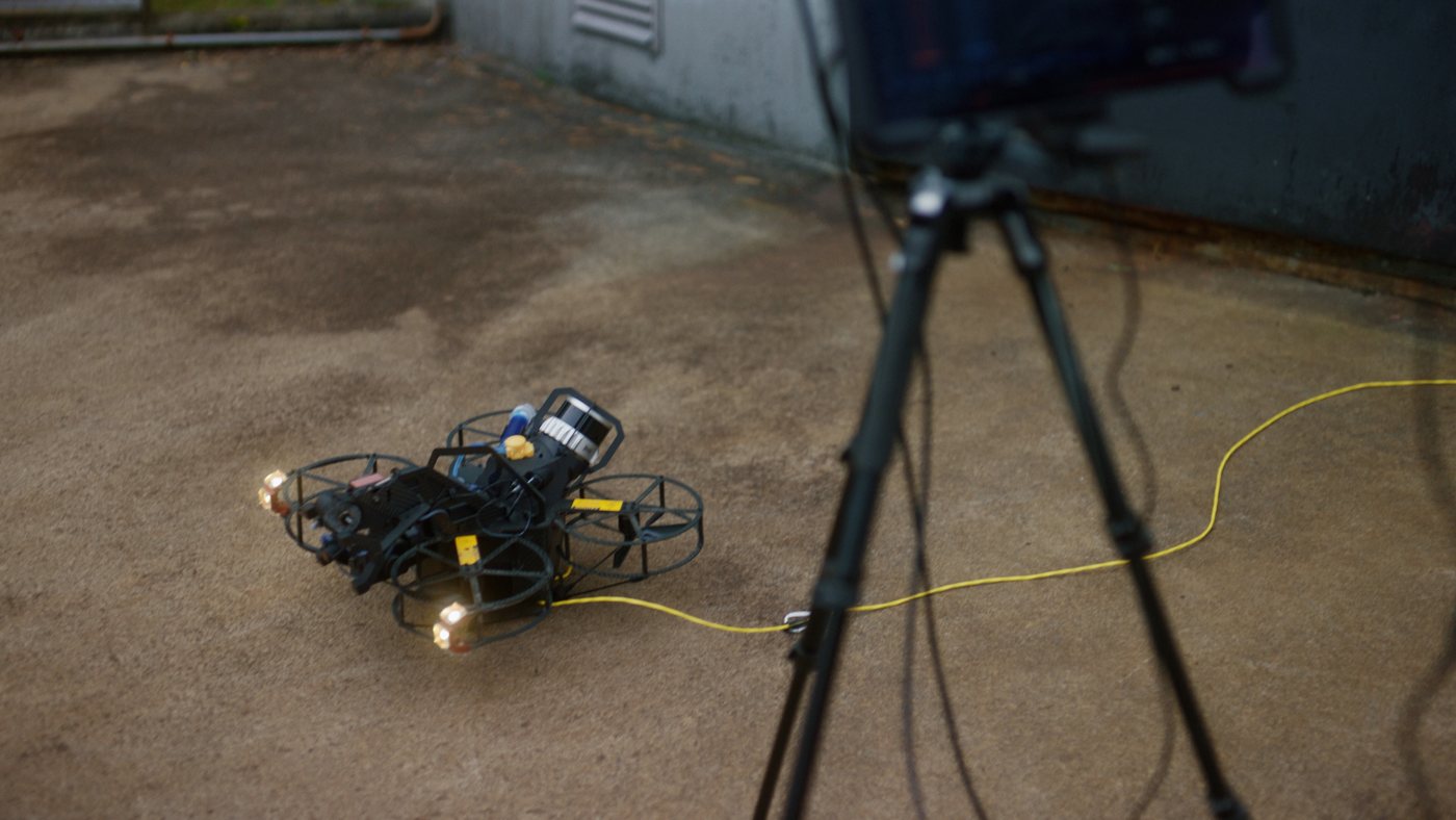 Close-up of the Scout 137 drone on the ground before flight