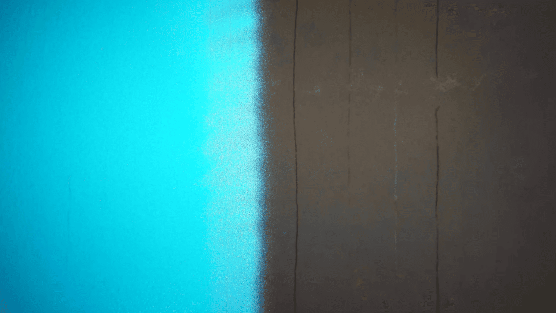 Photo of tank wall with blue paint, interior